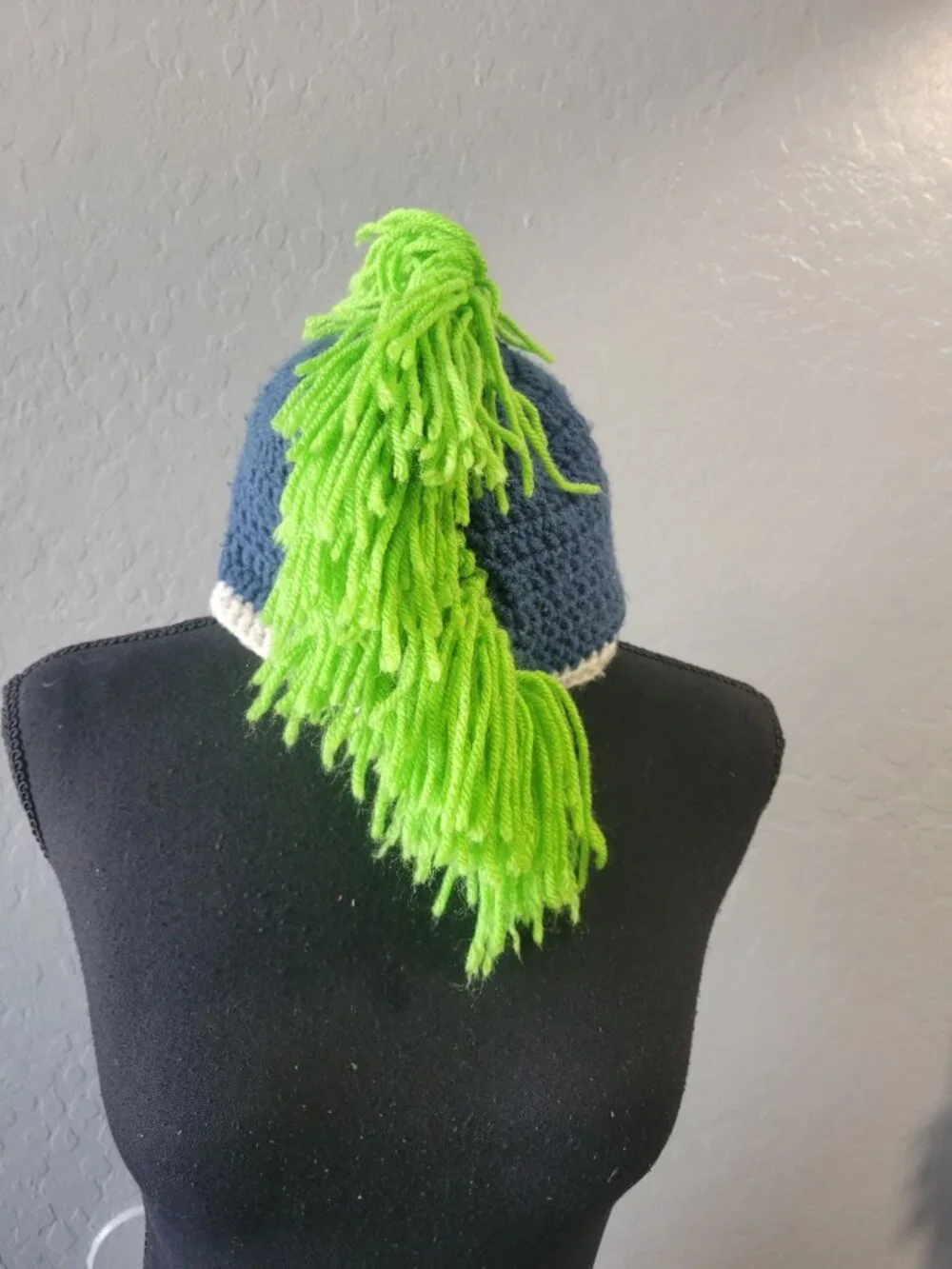 hand-crocheted Seattle Seahawks beanie blue yarn, a white brim, bright green Hat